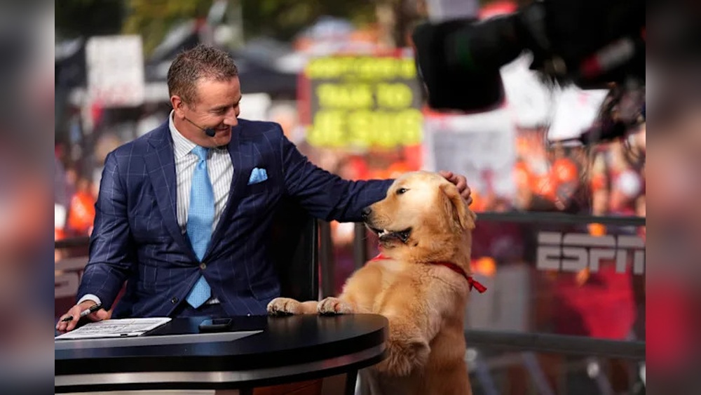 Why Does Kirk Herbstreit Travel With His Dog